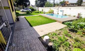 Imagem: Lindo espaço de lazer com piscina e churrasqueira