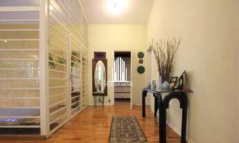 Imagem 6: 330m² de área construida, 3 dormitórios sendo 2 suítes, 5 banheiros, 3 salas, copa e cozin