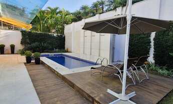 Imagem 3: Casa de condomínio para aluguel e venda possui 586 metros quadrados com 4 quartos