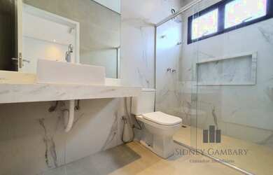 Imagem 6: Casa de condomínio para venda possui 235 metros quadrados com 3 quartos