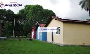 Imagem 2: Chácara com 28 hectares, fundo Rio Coxipo, lago, pé de um morro, com 3 chalés à venda por