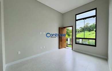 Imagem 3: Casa com 4 dormitorios sendo 01 suíte e vaga de garagem para 03 carros em Forquilhas - São