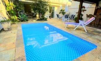 Imagem 2: Casa de condomínio para venda possui 348 metros quadrados com 4 quartos