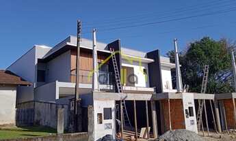 Imagem: Geminado em construção com quintal para