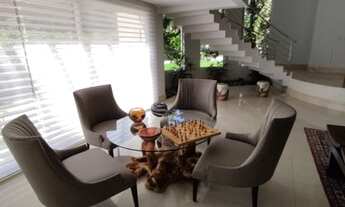 Imagem 4: Casa de condomínio para venda possui 596 metros quadrados com 4 quartos