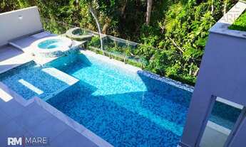 Imagem 2: Casa para venda tem 408 metros quadrados com 5 quartos em Riviera - Bertioga - SP