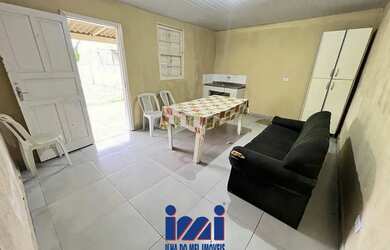 Imagem 4: Casa na praia com amplo espaço de terreno