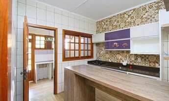 Imagem 4: Casa de 3 dormitórios a venda no bairro Guarujá, Porto Alegre