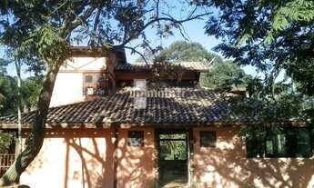 Imagem: CASA ESTILO RÚSTICO EM CONDOMÍNIO PRÓXIMO