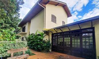 Imagem 2: Casa sobrado com 5 quartos sendo 1 suíte, 5 salas, lareira, sacadas, jardim, 4 vagas, 272m