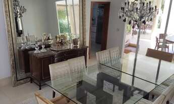 Imagem 6: Casa de condomínio para venda possui 596 metros quadrados com 4 quartos