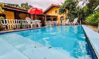 Imagem 4: Casa 3 dormitórios com piscina dentro de condomínio Locação Temporada em Caraguatatuba