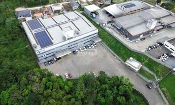 Imagem: Galpão com doca, 11m de pé direito, localização