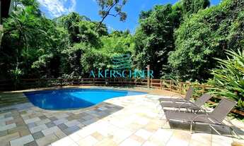 Imagem 5: ESPETACULAR CASA EM CONDOMÍNIO EM MEIO À NATUREZA, COM 4 SUÍTES E VISTA PARCIAL DO MAR