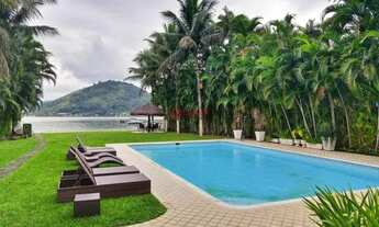 Imagem: Linda casa pé na areia com amplo terreno