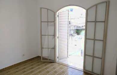 Imagem 2: Casa com 2 quartos, sala, cozinha, banheiro e área de serviço