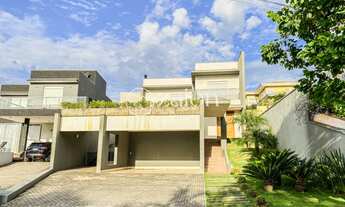 Imagem 2: Casa de alto padrão, 3 suítes com closet, piscina em condomínio de luxo, com lago, academi