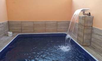 Imagem 2: Casa à venda com piscina e localizado à 1km do mar em Itanhaém, litoral sul de SP