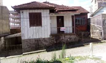 Imagem 2: Terreno com Casa de Madeira