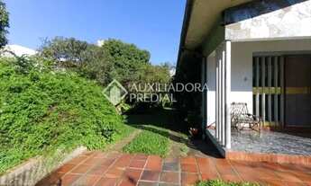 Imagem 7: Excelente terreno na zona Central de Canoas com uma casa com 3 dormitórios, sala de jantar