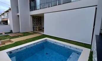 Imagem 7: Casa nova com piscina privativa em condomínio fechado próximo ao mar - 4 suítes finamente