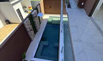 Imagem 2: Seu novo lar em alto padrão - Casa 4 suítes no Condomínio Vista Lagoa