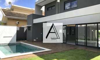 Imagem 4: MAGNIFICO SOBRADO ALPHAVILLE 1, COM 4 SUITES , SENDO UMA M ASTER E PISCINA DE 18M²