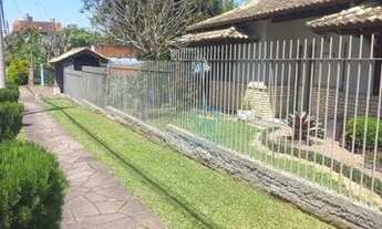 Imagem 3: Casa com 3 dormitórios para alugar, 277 m² por R$ 4.850,00/mês - Vila Nova - Novo Hamburgo