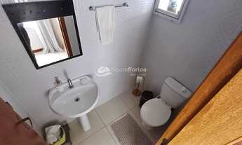 Imagem 4: Morar com tranquilidade e praticidade casa com 3 dormitórios, quintal e pé-direito alto n