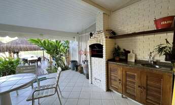 Imagem 3: Casa triplex a venda em condomínio fechado e barco na porta