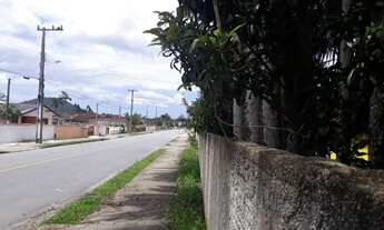 Imagem 6: Casa com Terreno de Esquina, Ideal para Construção de um Prédio