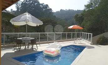 Imagem 3: Casa com 4 suítes muito bem localizada no condomínio Alpes da Cantareira na Serra da Canta