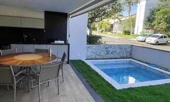 Imagem 3: Casa nova com piscina privativa em condomínio fechado próximo ao mar - 4 suítes finamente