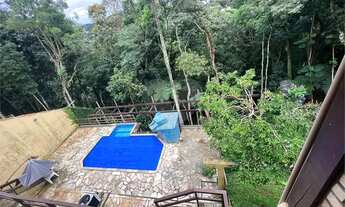 Imagem 2: Linda casa na Serra da Cantareira sendo 4 dormitórios sendo 1 suíte master com hidromassag