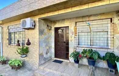 Imagem: Casa com 03 dormitorios e 4 vagas de garagem