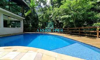 Imagem 3: ESPETACULAR CASA EM CONDOMÍNIO EM MEIO À NATUREZA, COM 4 SUÍTES E VISTA PARCIAL DO MAR