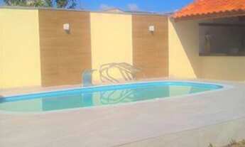 Imagem 2: Casa 100 metros da Praia, 3dm.sendo 2 Suítes, 450m² de terreno, no bairro Indaiá em Caragu