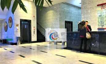 Imagem 3: Sala comercial de 568,00 m² com 20 vagas de garagem, piso elevado com carpete, forro modul