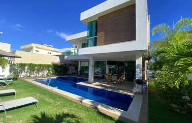 Imagem 2: Casa de condomínio para venda possui 450 metros quadrados com 4 quartos