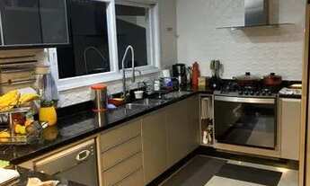 Imagem 2: Casa de condomínio sobrado para aluguel possui 400 metros quadrados com 4 quartos