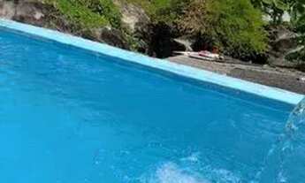 Imagem 7: Casa em cima e em baixo primeiro andar com piscina