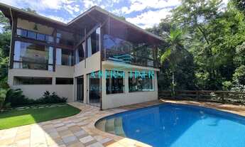 Imagem 2: ESPETACULAR CASA EM CONDOMÍNIO EM MEIO À NATUREZA, COM 4 SUÍTES E VISTA PARCIAL DO MAR