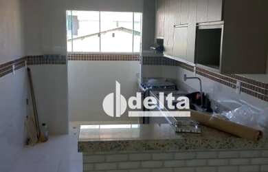 Imagem 2: Apartamento com 2 dormitórios para alugar, 60 m² por R$ 1.200/mês - Santa Mônica - Uberlân