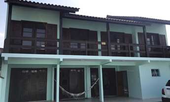 Imagem: LINDA CASA COM VISTA PARA O MAR NA PRAIA