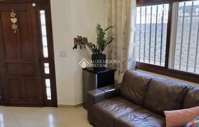 Imagem 5: CASA EM CANOAS COM LAREIRA,CHURRASQUEIRA E PÁTIO