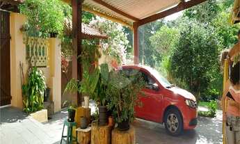 Imagem 5: Casa aconchegante em condomínio residencial em meio a muito verde