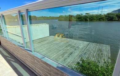 Imagem 3: Linda casa à beira-rio com 2 quartos, piscina e área gourmet em Unamar - Cabo Frio - RJ