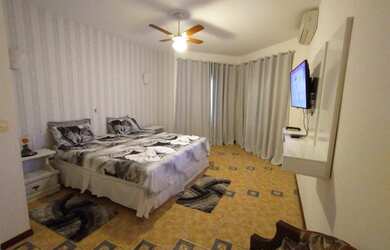 Imagem 4: Casa de condomínio para aluguel e venda possui 390 metros quadrados com 4 quartos