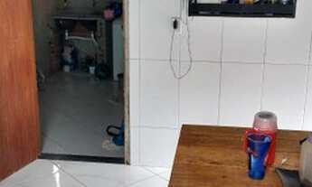 Imagem 2: Casa em rua pública