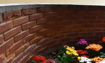 Imagem 2: Apto Bela Vista com 2 dormitórios, com armários, cozinha, pequeno quintal e 1 vaga de gara